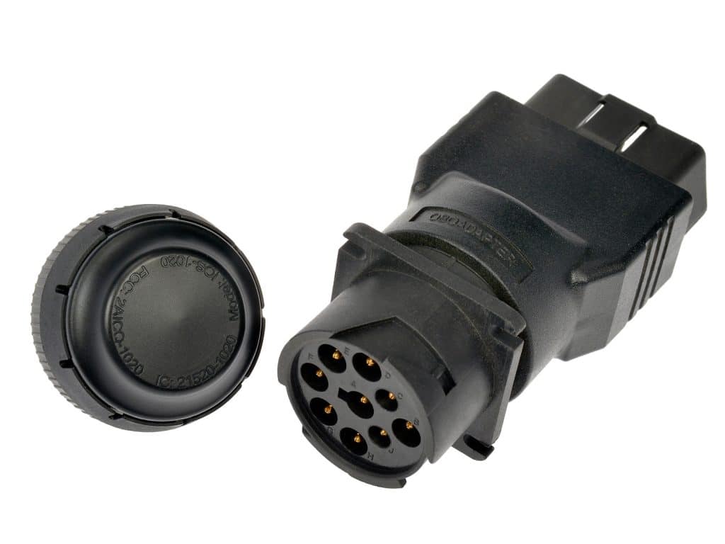 Image of a Roadwarrior Diesel Decoder and a 9-pin to OBDII adapter.